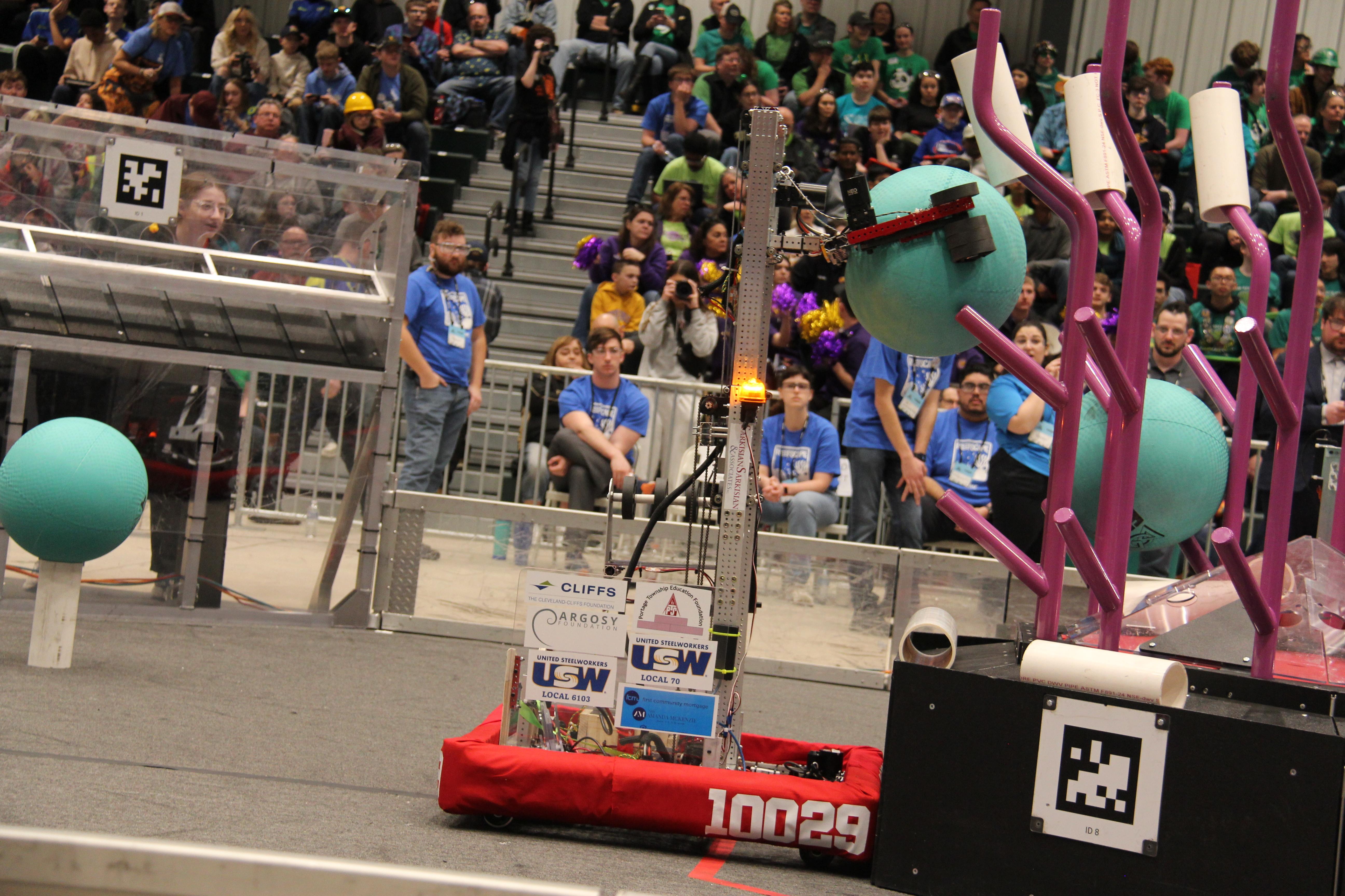 Robot taking algae off reef