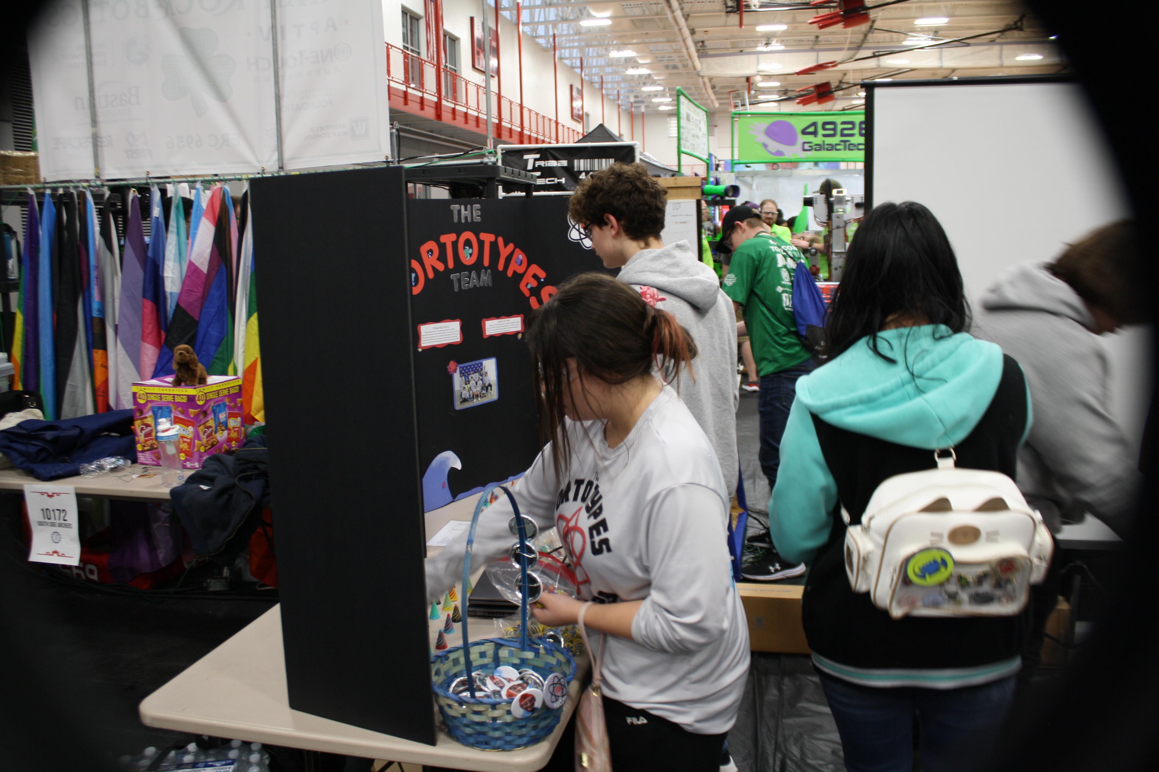 Team members setting up pit for judges
