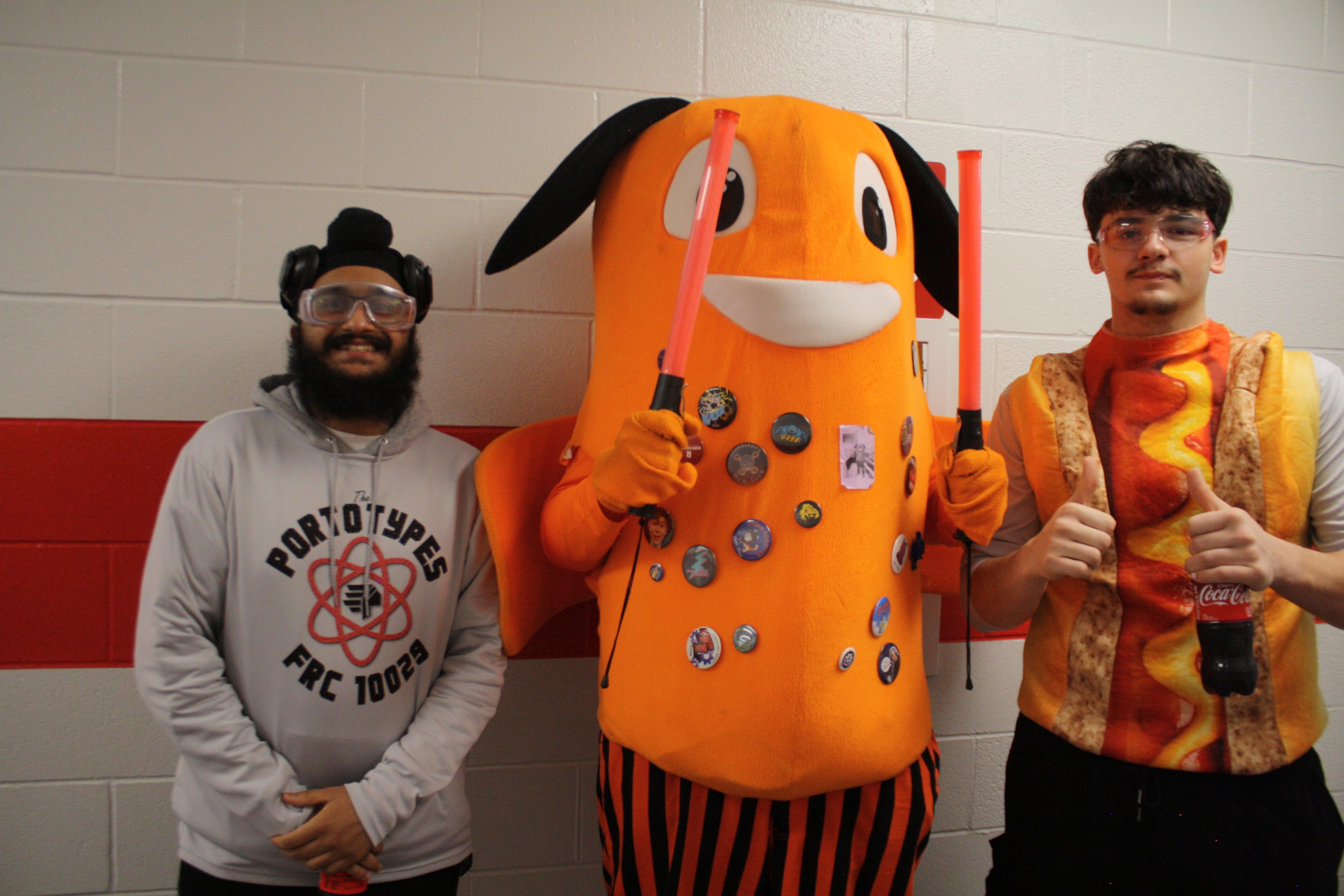 Posing with other team mascot