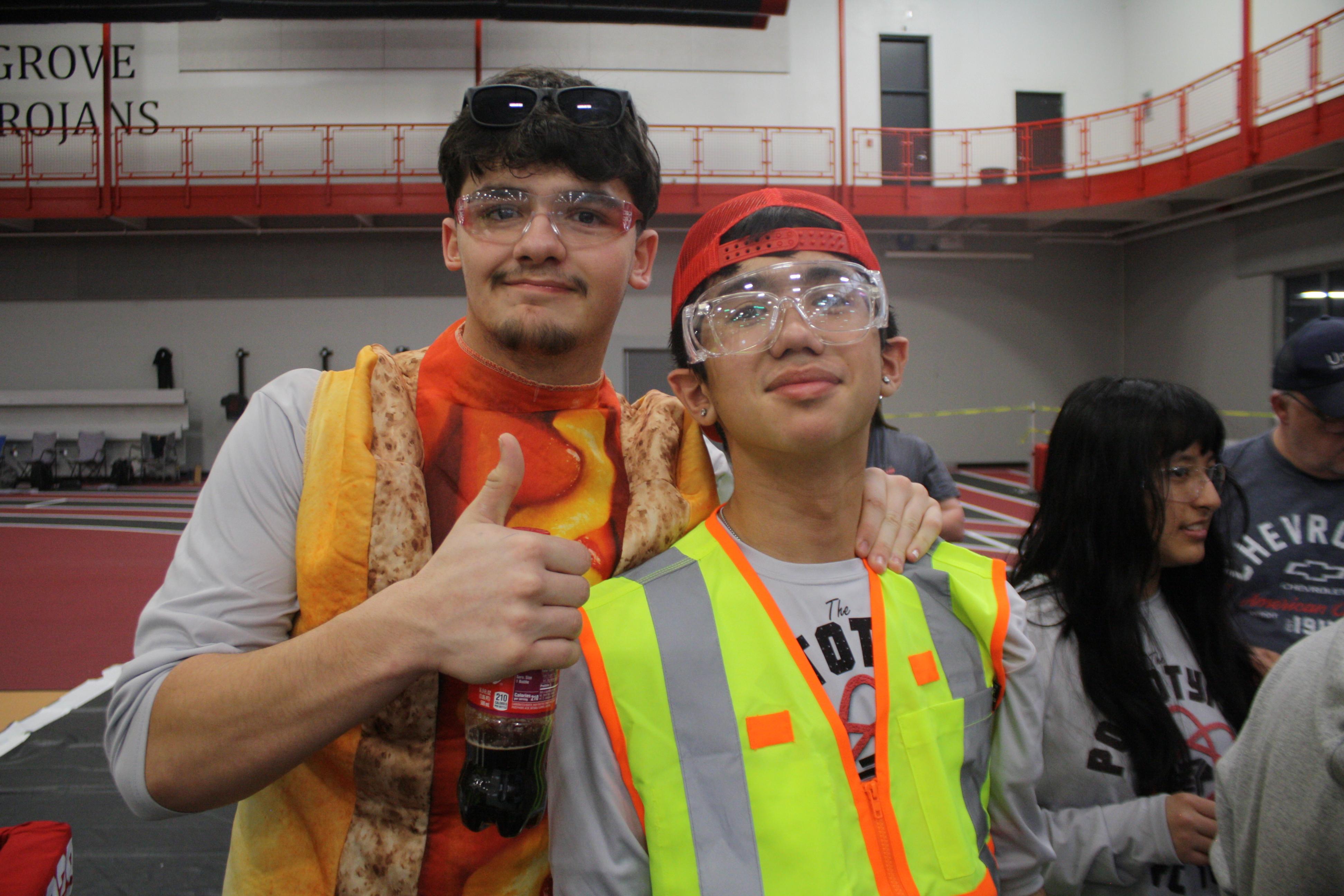 Two team members smiling for the camera